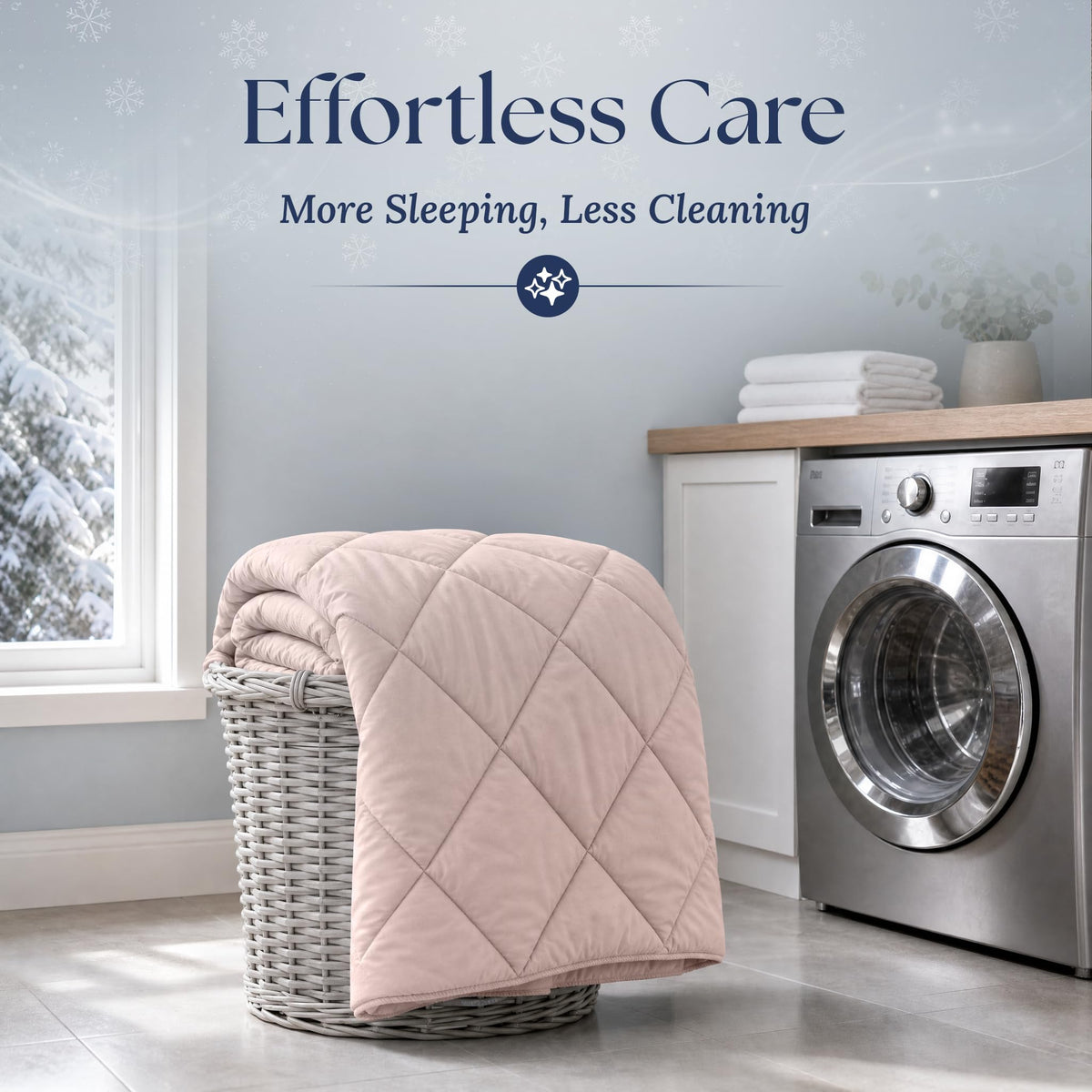 Blush pink quilted comforter draped over a wicker laundry basket beside a washing machine. Graphic reads "Effortless Care".