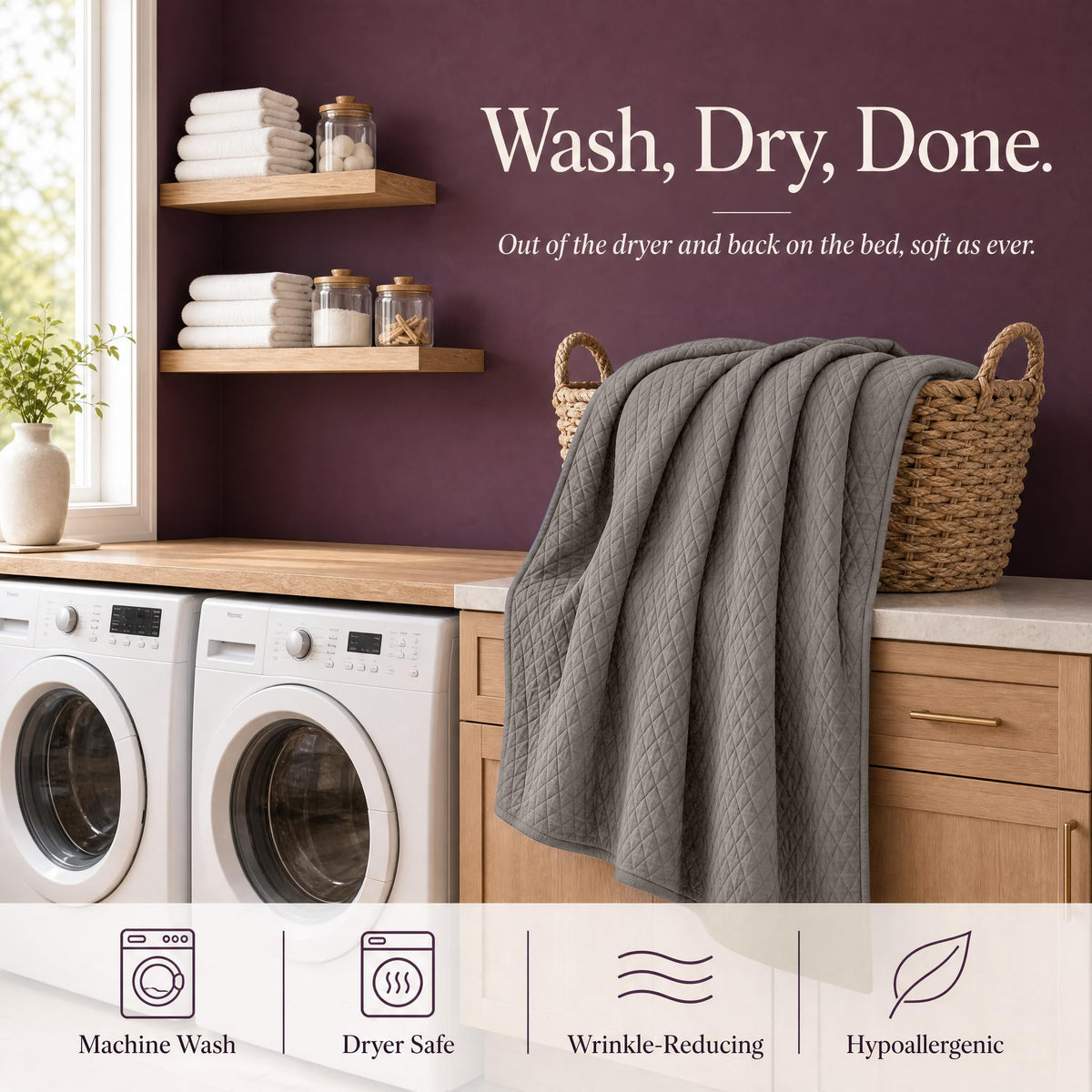 Taupe quilt draped over a wicker basket above laundry machines beneath "Wash, Dry, Done".