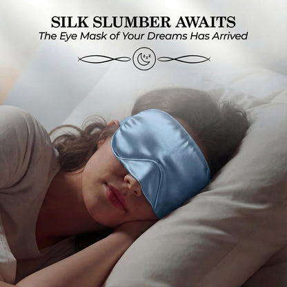 Person sleeping on their side wearing a light blue sleep mask beneath "Silk Slumber Awaits".