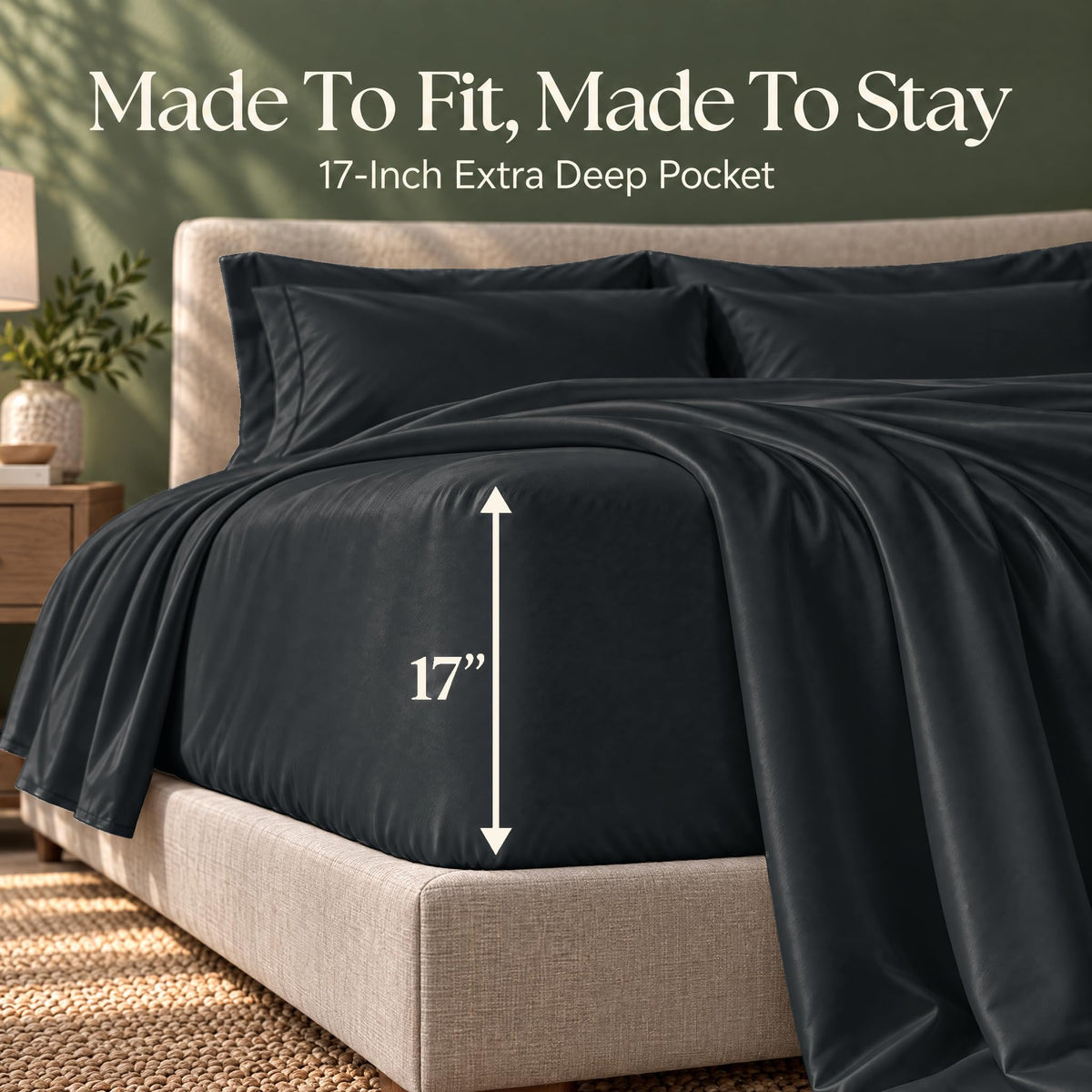 Black fitted sheet on a bed, with an arrow labeling the pocket depth as 17 inches.