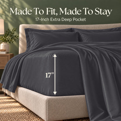 Dark gray fitted sheet on a bed, with an arrow labeling the pocket depth as 17 inches.
