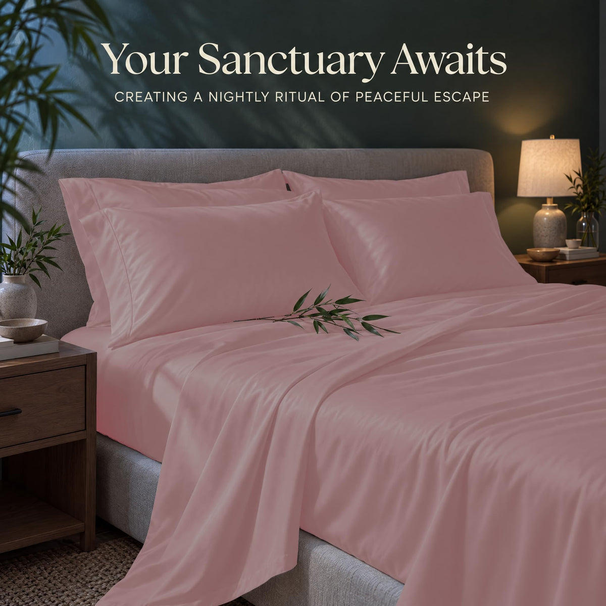Pink sheets and matching pillows on a bed beside a lamp, beneath the heading "Your Sanctuary Awaits".