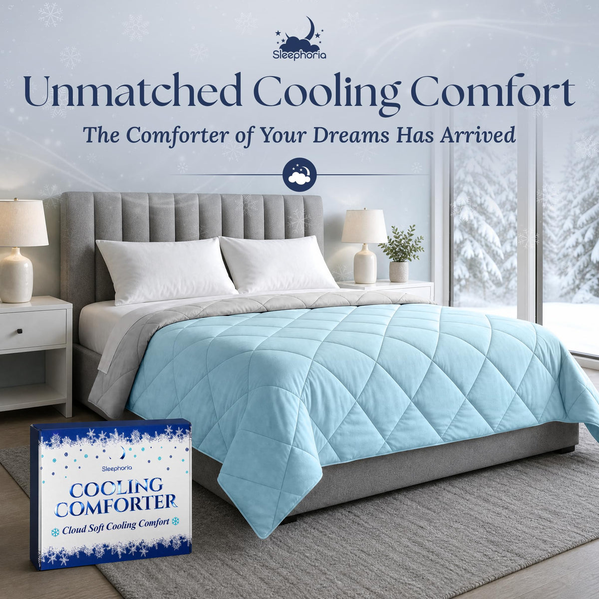 Light blue quilted comforter with a light gray reverse on a gray upholstered bed, beside Sleephoria packaging.