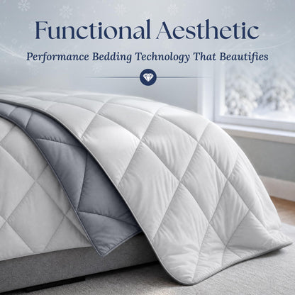 Close view of a light gray diamond quilted comforter draped over a bed, showing its dark gray reverse and piped edge.