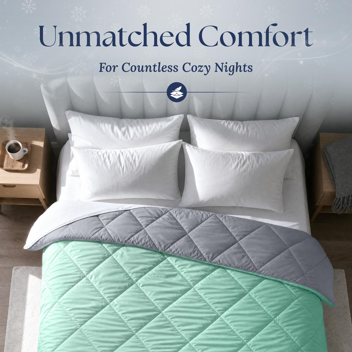 Overhead view of a mint green diamond quilted comforter folded back to show its gray reverse, with four white pillows.