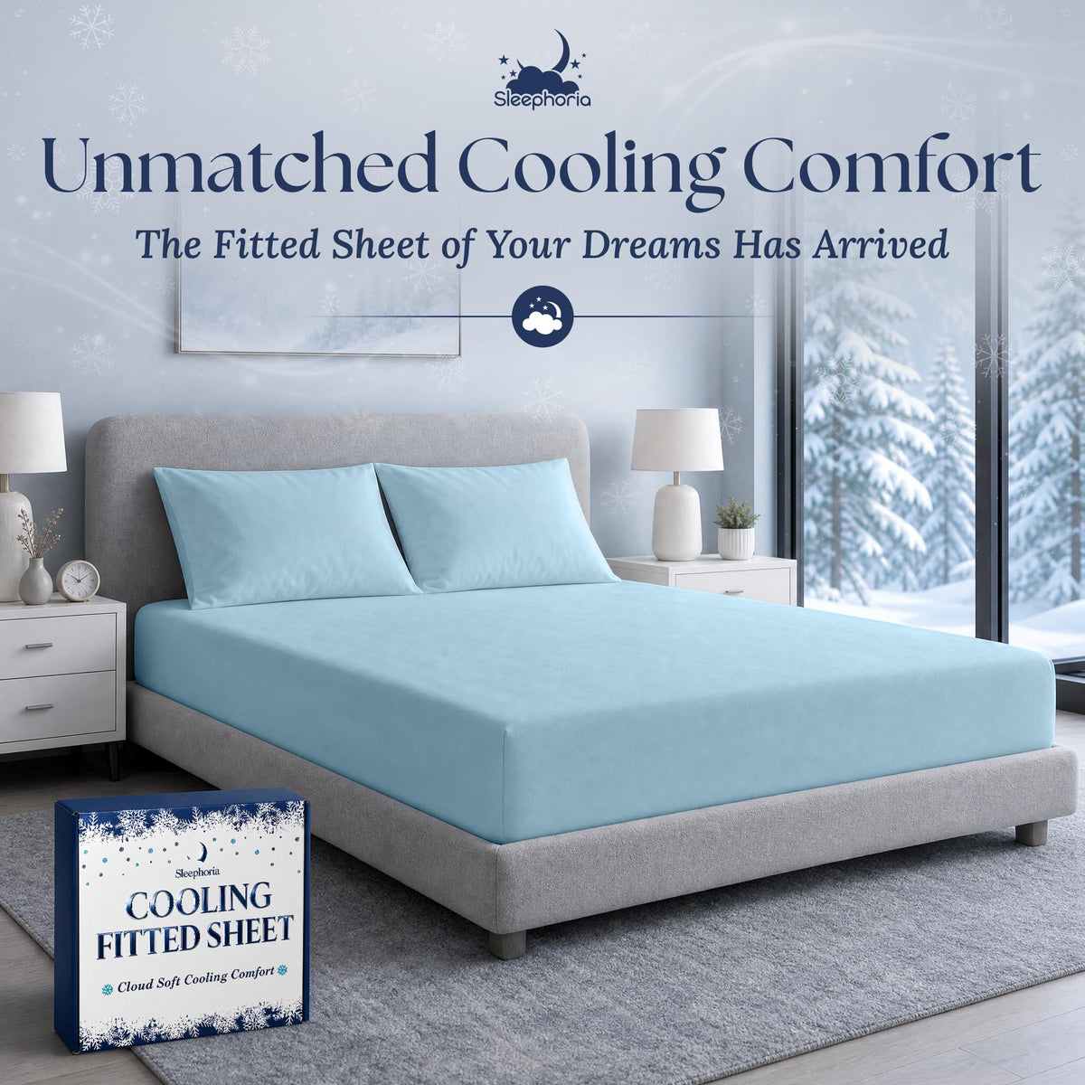 Light blue fitted sheet pulled over a mattress with two matching pillows on a gray bed, beside Sleephoria packaging.