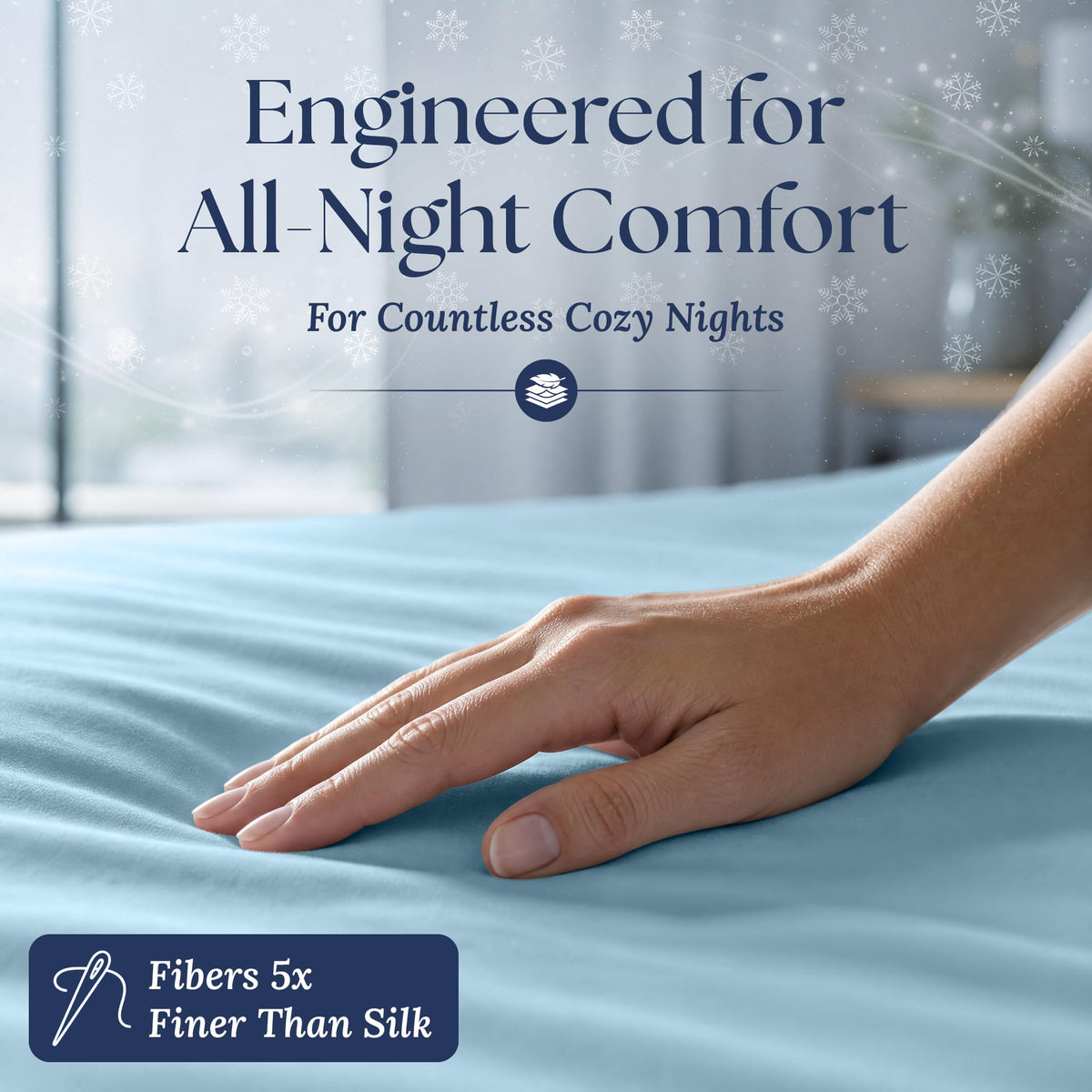 A hand smoothing a light blue fitted sheet. The graphic reads "Fibers 5x Finer Than Silk".