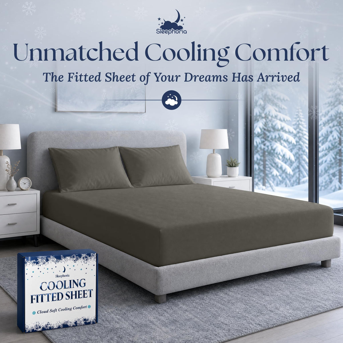Warm gray fitted sheet pulled over a mattress with two matching pillows on a gray bed, beside Sleephoria packaging.