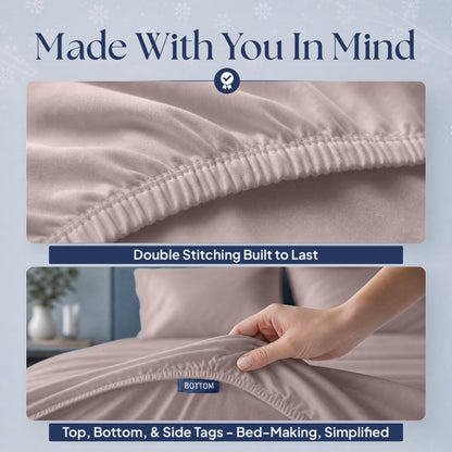 Blush pink fitted sheet details showing double stitching along the elastic edge and a hand holding the "BOTTOM" orientation tag.
