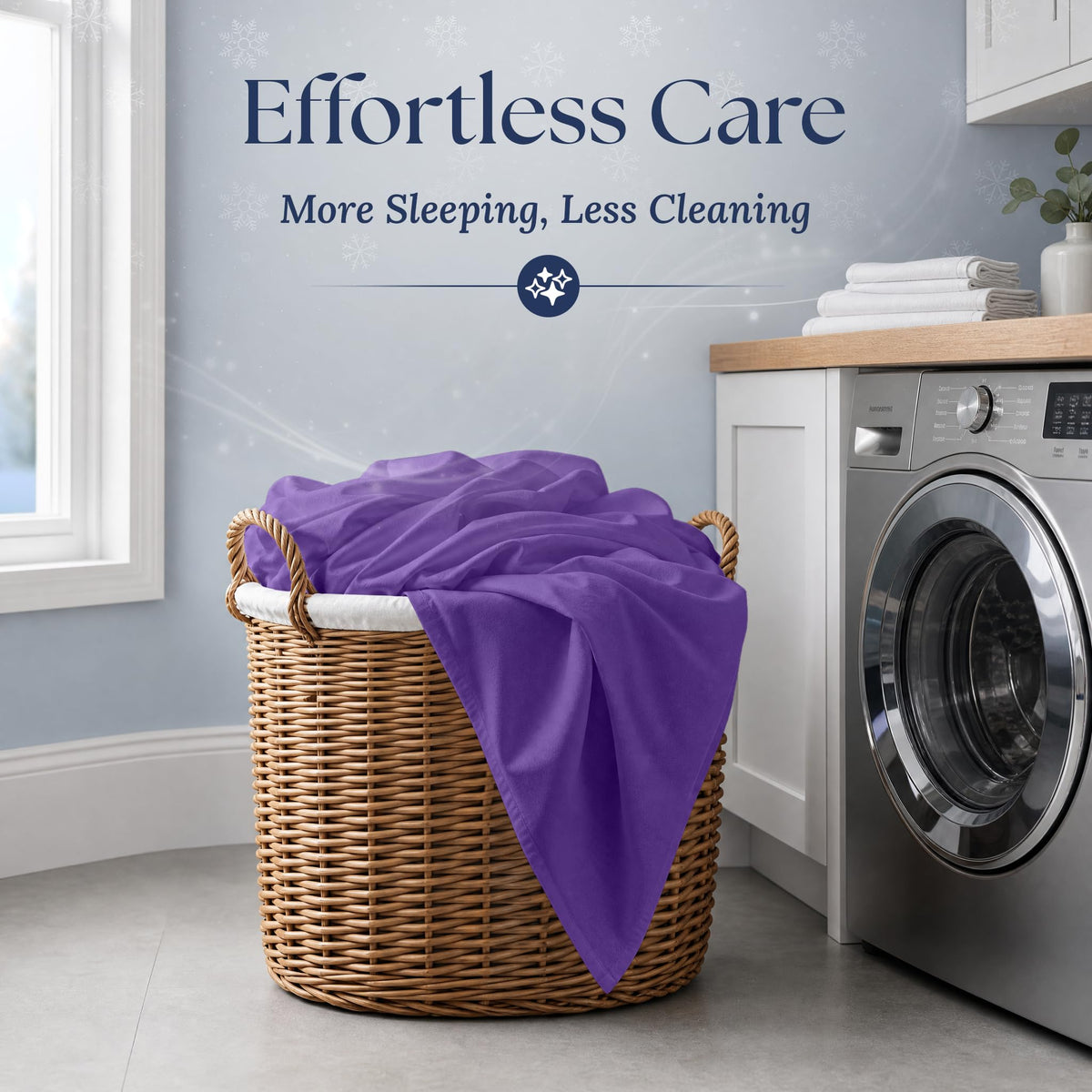 Purple fitted sheet draped over a wicker laundry basket beside a washing machine. Graphic reads "Effortless Care".