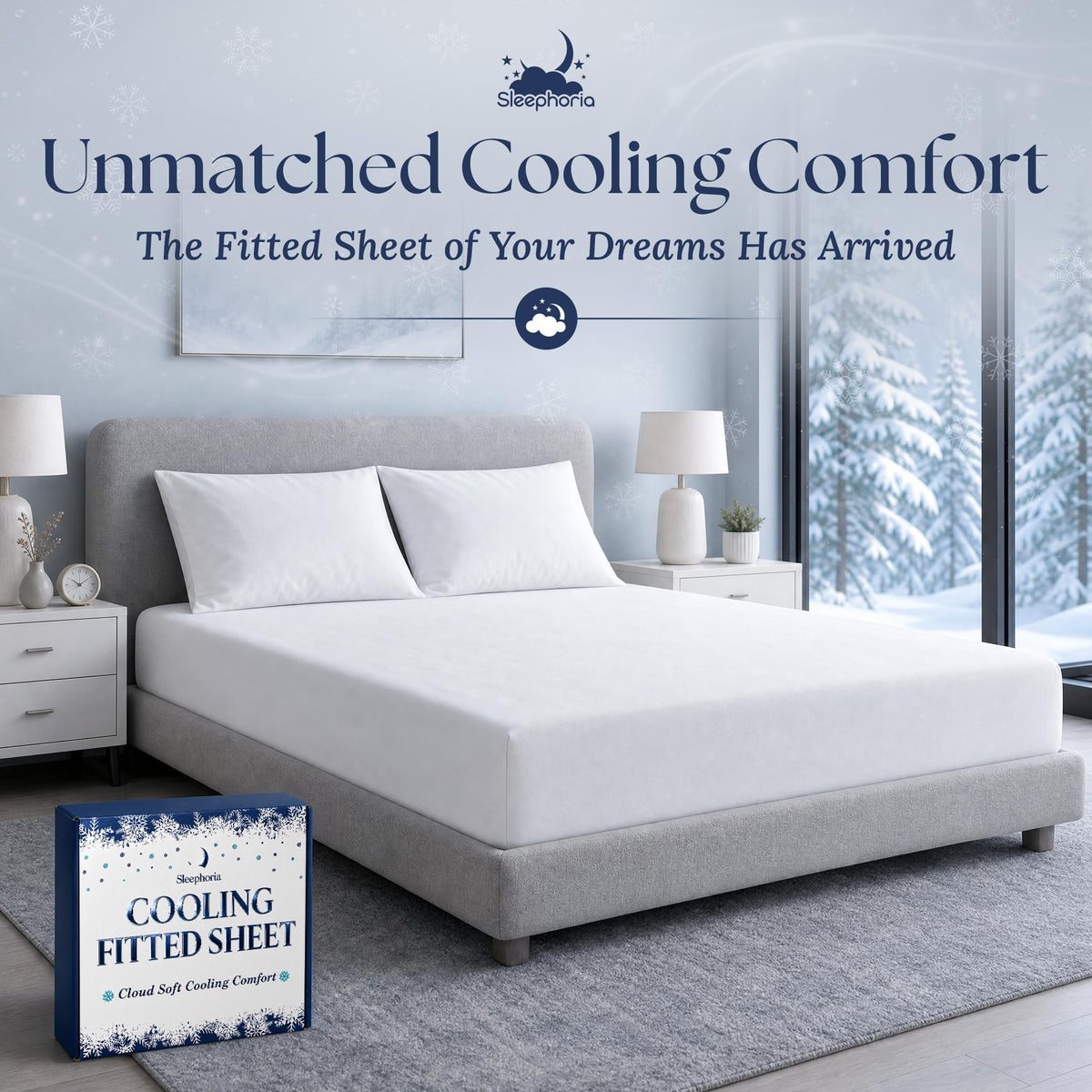 White fitted sheet pulled over a mattress with two matching pillows on a gray bed, beside Sleephoria packaging.