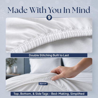 White fitted sheet details showing double stitching along the elastic edge and a hand holding the "BOTTOM" orientation tag.