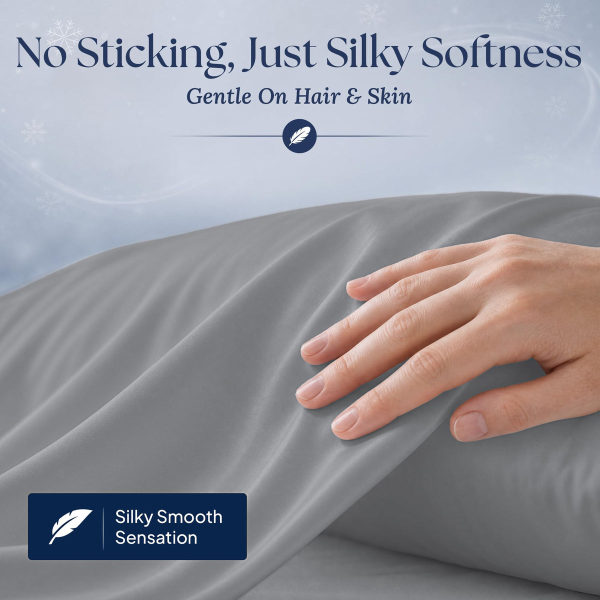 A hand gliding over a dark gray pillowcase. Graphic reads "No Sticking, Just Silky Softness" and "Gentle On Hair & Skin".