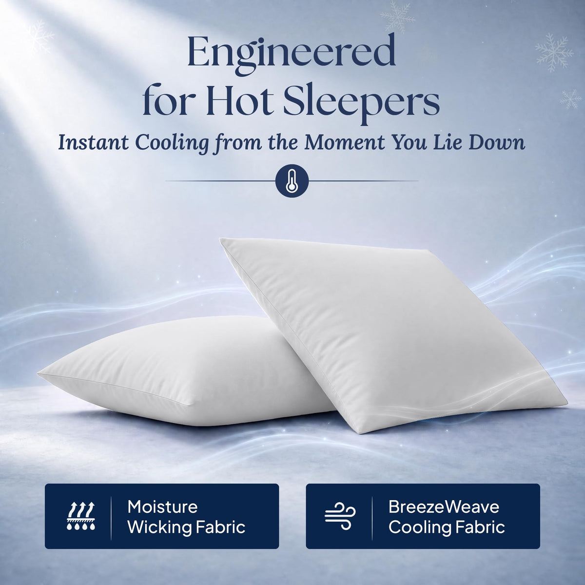 Two light gray pillows with illustrated airflow. Graphic labels: moisture wicking fabric and BreezeWeave cooling fabric.
