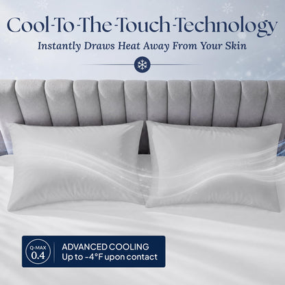 Light gray pillowcases on two pillows with a flowing light effect. Graphic labels: Q-MAX 0.4 and "Up to -4°F upon contact".