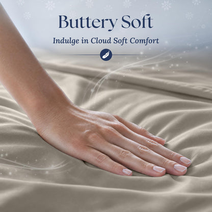 A hand smoothing beige fabric with a soft sheen. Graphic reads "Buttery Soft".