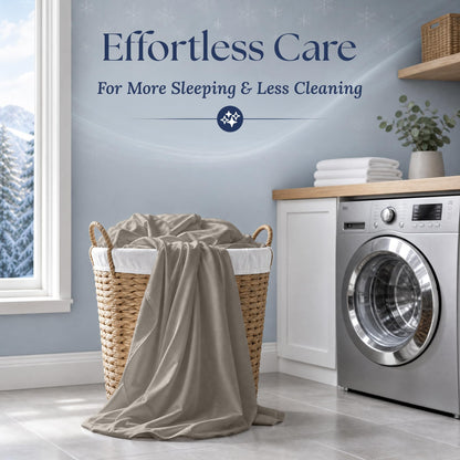 Beige sheets draped over a wicker laundry basket beside a washing machine. Graphic reads "Effortless Care".