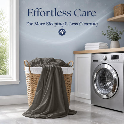 Dark gray sheets draped over a wicker laundry basket beside a washing machine. Graphic reads "Effortless Care".