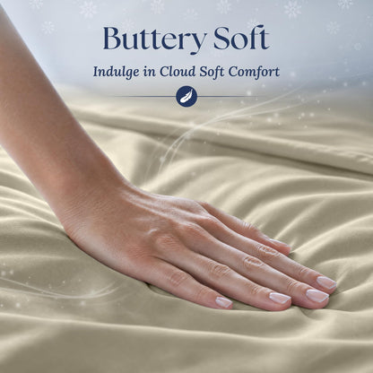 A hand smoothing cream fabric with a soft sheen. Graphic reads "Buttery Soft".