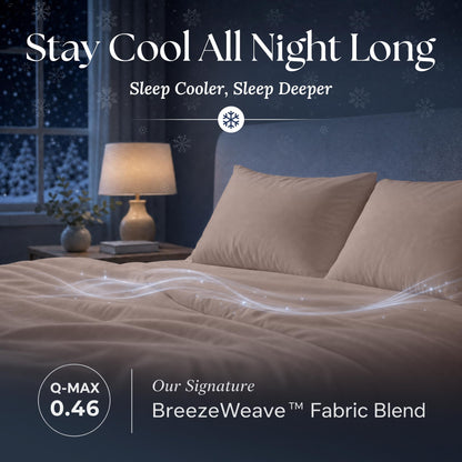 Blush pink sheets and matching pillows on a bed at night with flowing light effects and BreezeWeave and Q-MAX 0.46 labels.