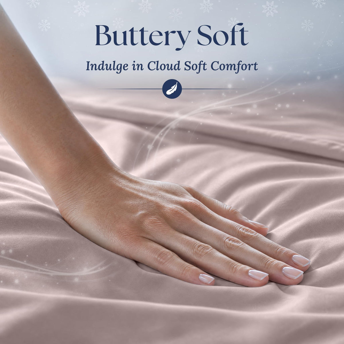 A hand smoothing blush pink fabric with a soft sheen. Graphic reads "Buttery Soft".