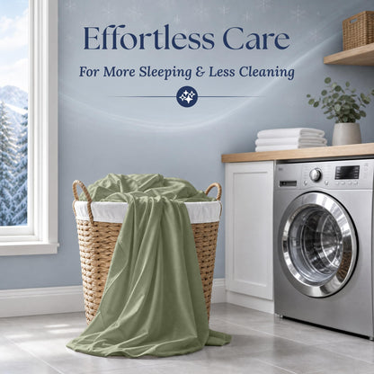 Sage green sheets draped over a wicker laundry basket beside a washing machine. Graphic reads "Effortless Care".