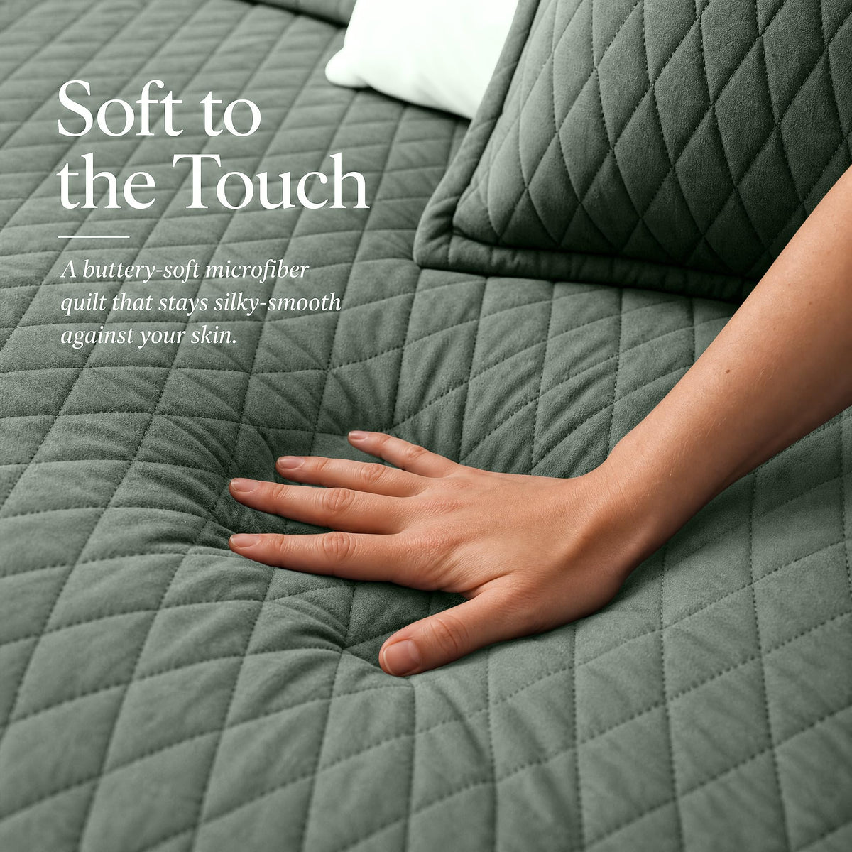 Hand touching a sage green diamond stitched quilt beside matching shams beneath "Soft to the Touch".