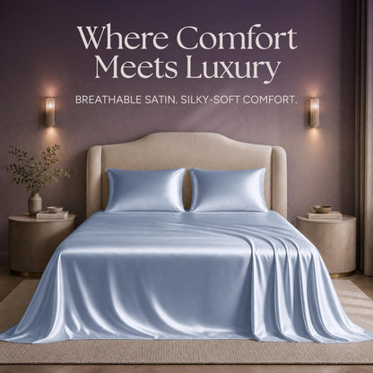 Light blue satin sheets and two matching pillows on a bed beneath "Where Comfort Meets Luxury".