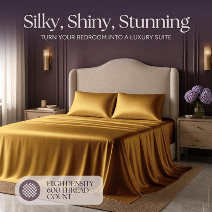 Gold satin bedding on an upholstered bed beneath "Silky, Shiny, Stunning", with a printed 600 thread count label.