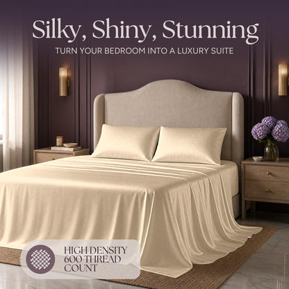Champagne satin bedding on an upholstered bed beneath "Silky, Shiny, Stunning", with a printed 600 thread count label.