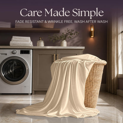 Champagne satin fabric draped over a wicker laundry basket beside a washing machine beneath "Care Made Simple".