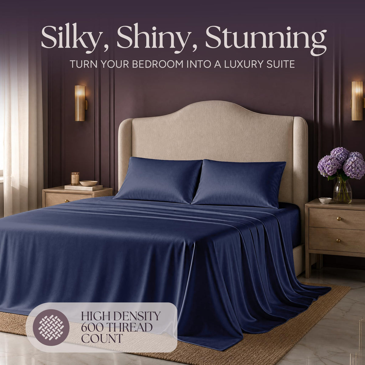 Navy blue satin bedding on an upholstered bed beneath "Silky, Shiny, Stunning", with a printed 600 thread count label.