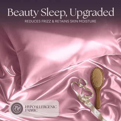 Pink satin pillow and rumpled fabric with a wooden hairbrush and ribbon beneath "Beauty Sleep, Upgraded".