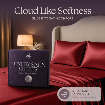 Red satin pillows and sheets beside a purple sheet box, beneath the heading "Cloud Like Softness".