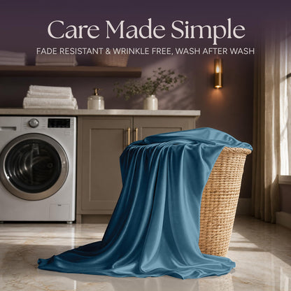 Teal blue satin fabric draped over a wicker laundry basket beside a washing machine beneath "Care Made Simple".