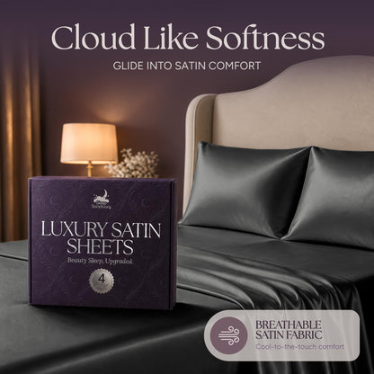 Dark gray satin pillows and sheets beside a purple sheet box, beneath the heading "Cloud Like Softness".