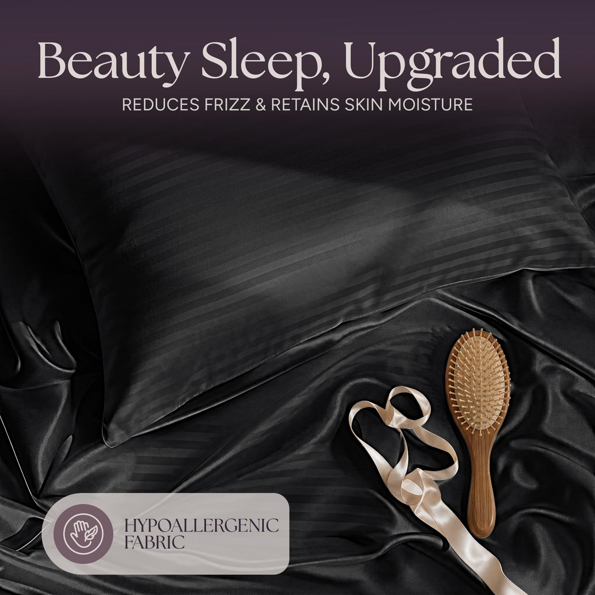 Black striped satin pillow and rumpled fabric with a wooden hairbrush and ribbon beneath "Beauty Sleep, Upgraded".