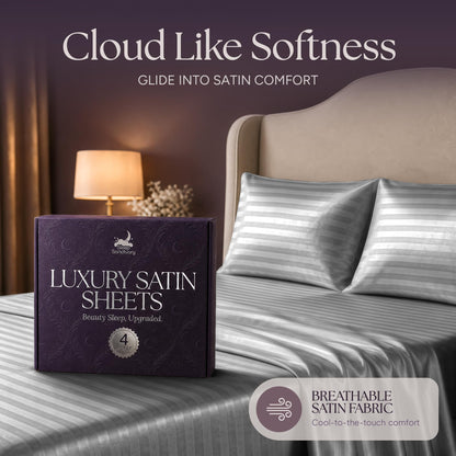 Silver gray striped satin pillows and sheets beside a purple sheet box, beneath the heading "Cloud Like Softness".