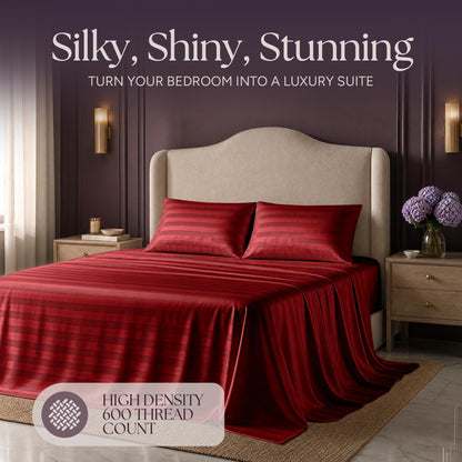 Red striped satin bedding on an upholstered bed beneath "Silky, Shiny, Stunning", with a printed 600 thread count label.