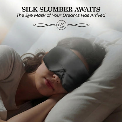 Person sleeping on their side wearing a black wide sleep mask beneath "Silk Slumber Awaits".