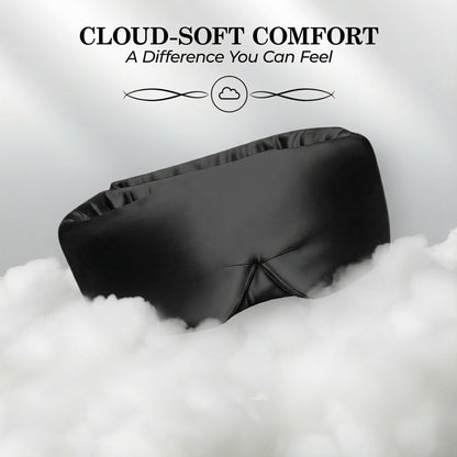 Black wide sleep mask resting on white cloudlike fluff beneath "Cloud-Soft Comfort".