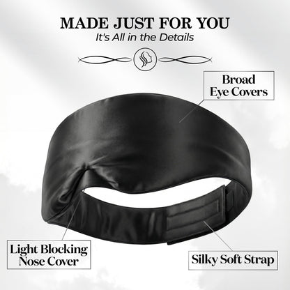 Black wide sleep mask viewed from behind, with labels pointing to broad eye covers, nose cover and adjustable fastening strap.