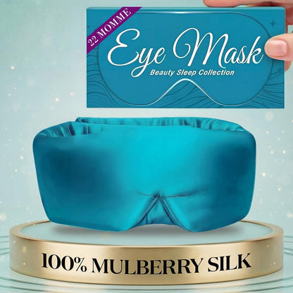 Teal wide sleep mask below a hand holding an Eye Mask box, with printed 22 momme and 100% Mulberry Silk labels.