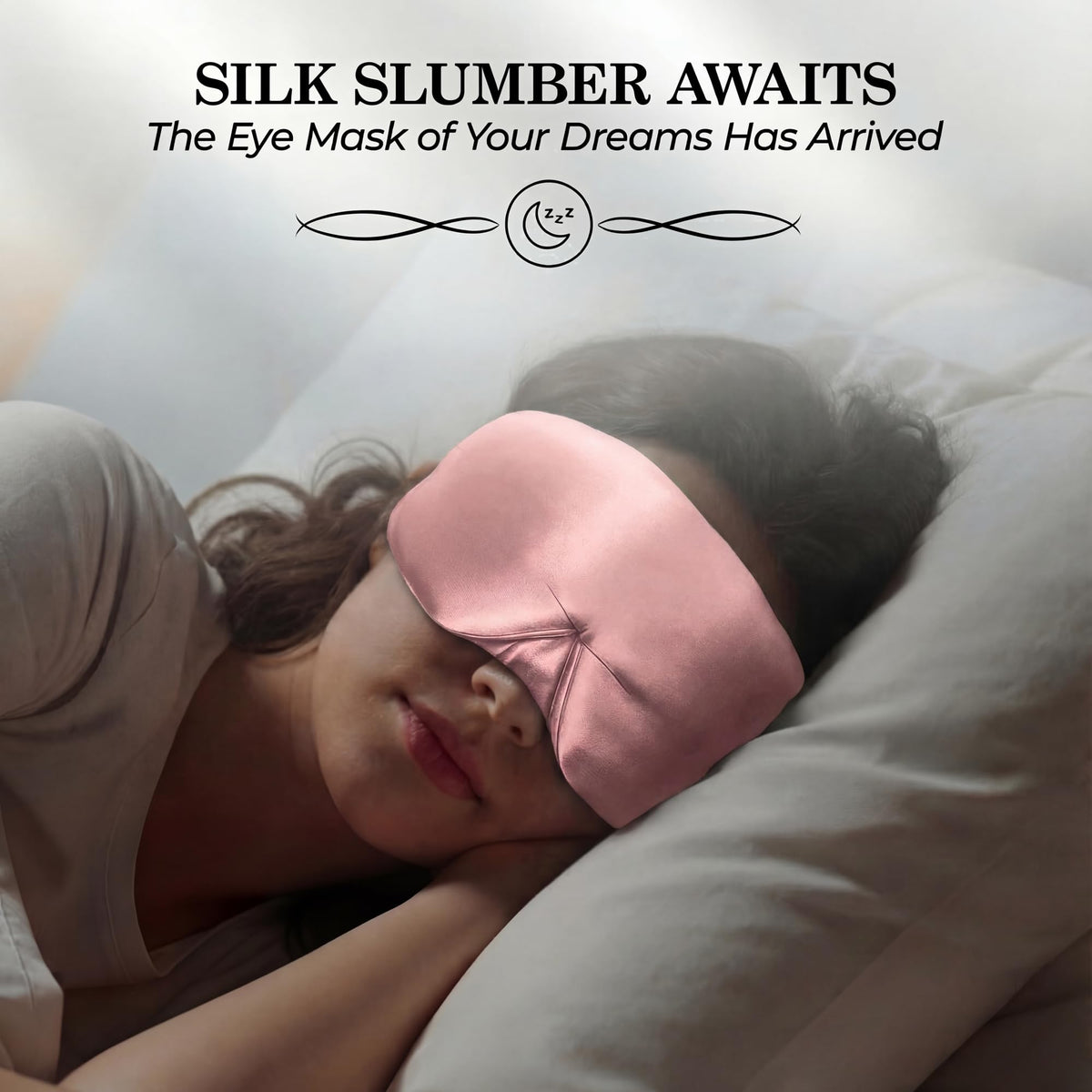 Person sleeping on their side wearing a pink wide sleep mask beneath "Silk Slumber Awaits".