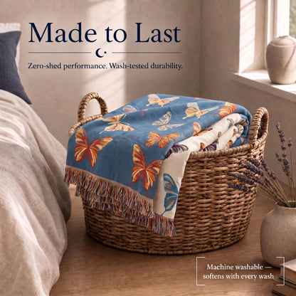 Blue butterfly patterned fringed throw draped over a wicker laundry basket beneath "Made to Last".